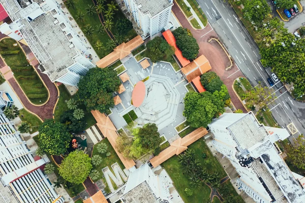 Overhead view of a business park with several office buildings and shared grounds
