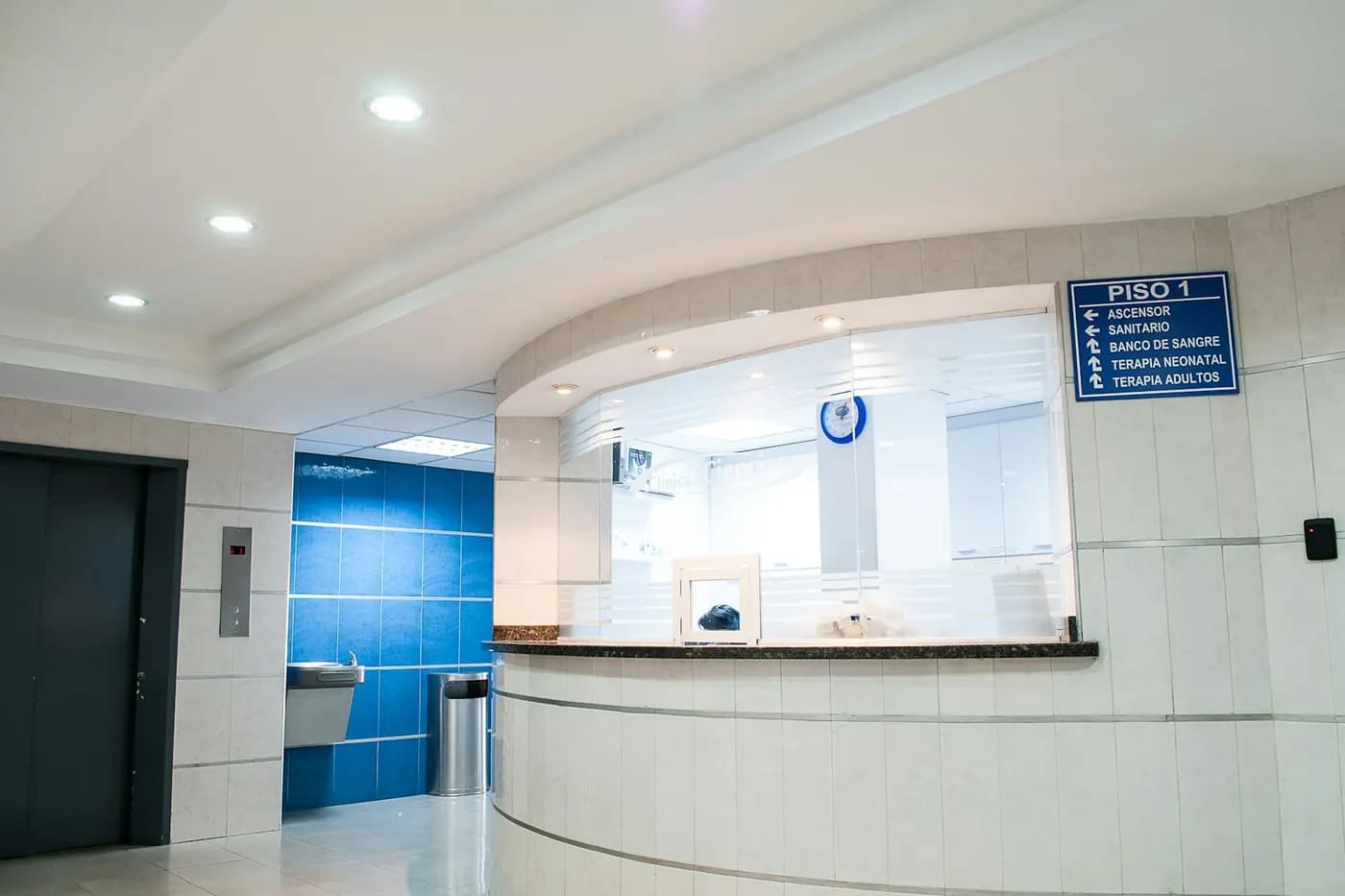 Coworking center reception desk and lift lobby at the start of a working day